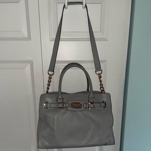 Michael Kors light grey leather purse w/ rose gold hardware
